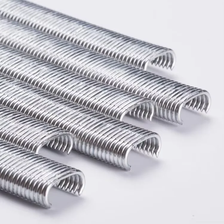 Close view of C-shaped hog-ring strips and their pointed ends