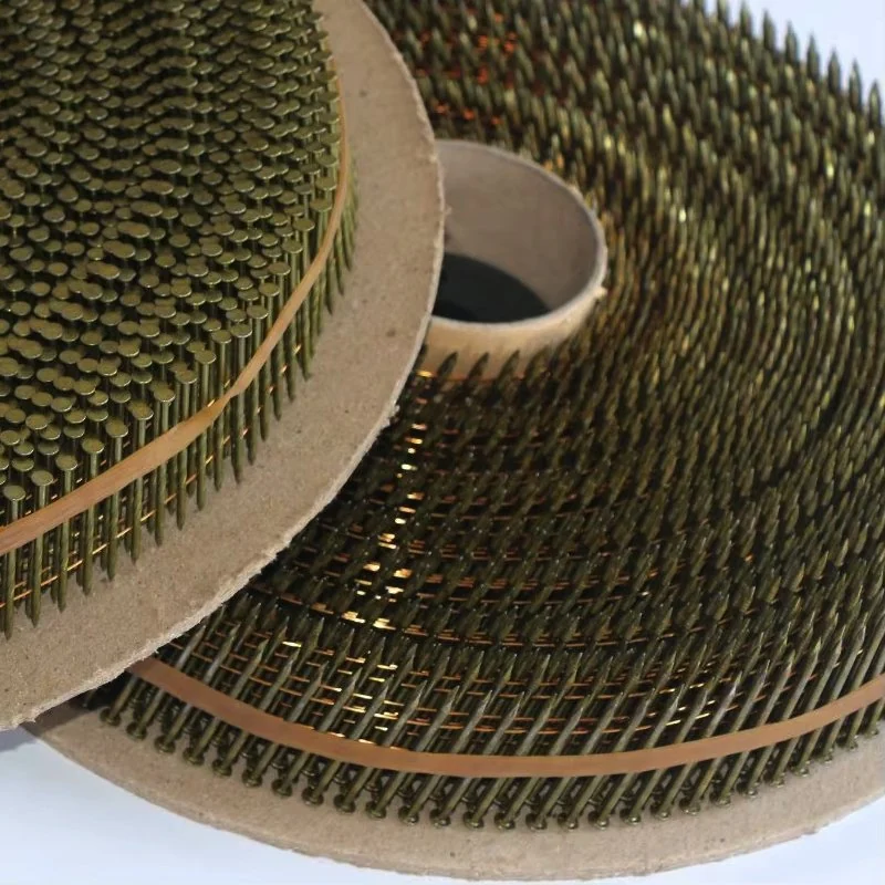 Tilted jumbo coils showing layered paper reels and nail shanks